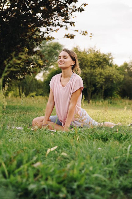 Calm woman with eyes closed, practicing breathing exercises in a tranquil environment
